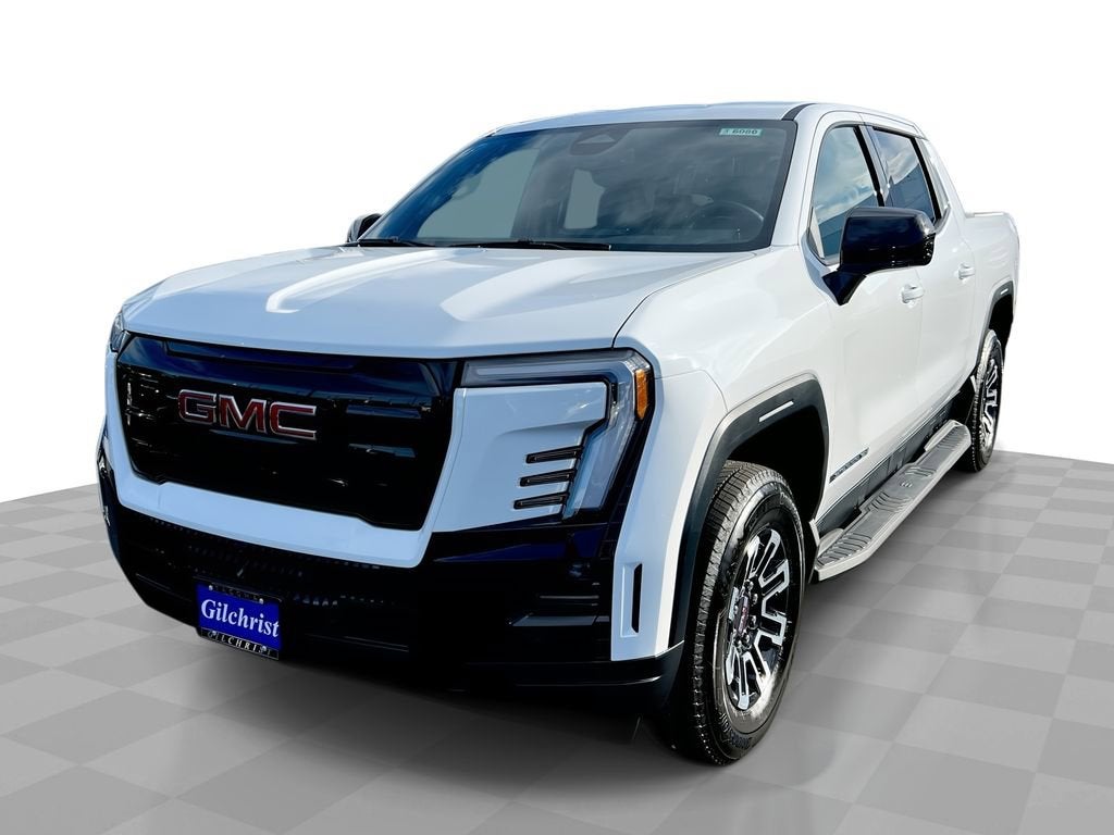2026 GMC Sierra EV Elevation Standard Range in Summit White — front three-quarter view