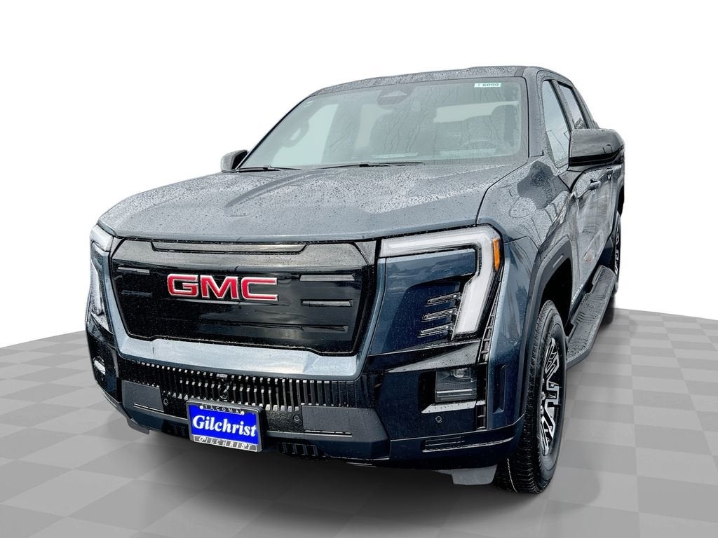 2026 GMC Sierra EV Elevation Standard Range in Deep Ocean Metallic — front three-quarter view