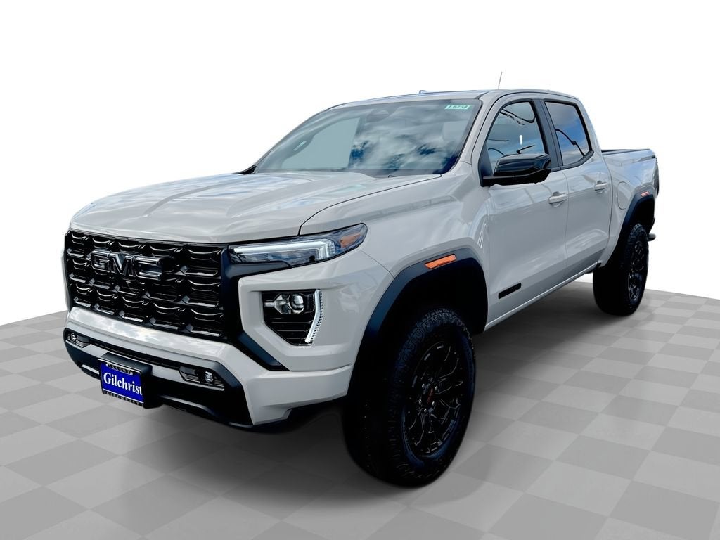 2026 GMC Canyon Elevation in Coastal Dune — front three-quarter view