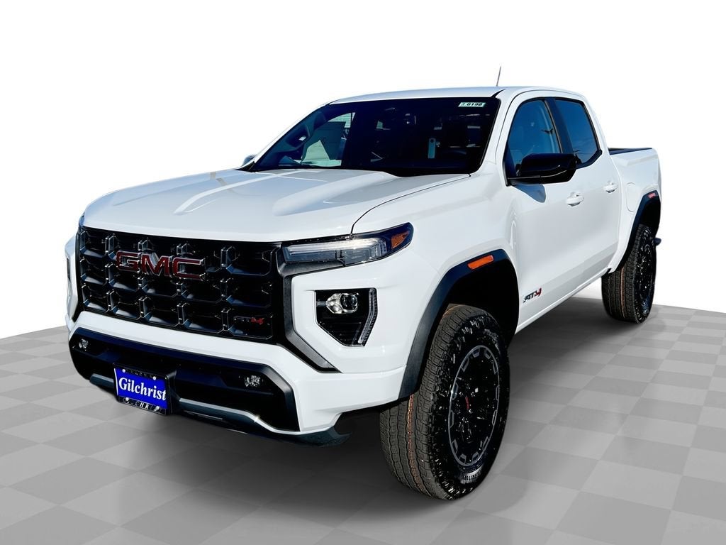 2026 GMC Canyon AT4 in Summit White — front three-quarter view