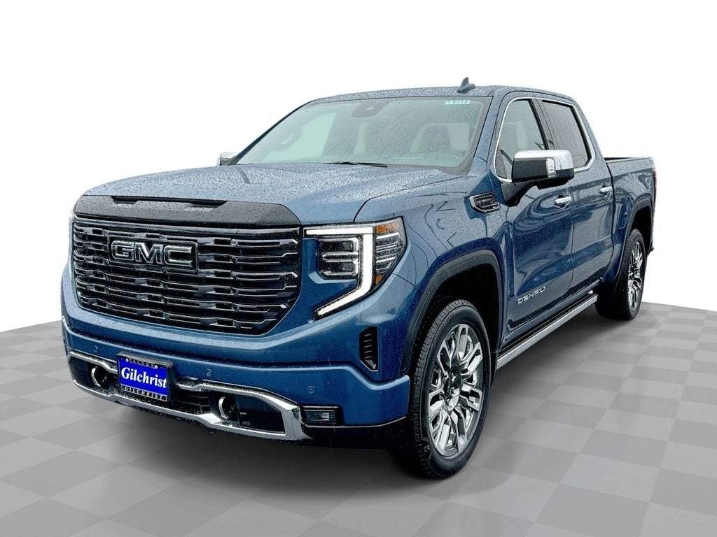 2026 GMC Sierra 1500 Denali Ultimate in Downpour Metallic — front three-quarter view