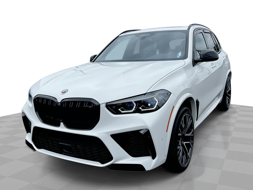 2023 BMW X5 M NA in White — front three-quarter view